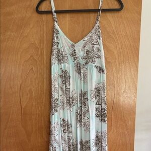 Soft, pretty sun dress bought in Barbados. White, light aqua and brown.